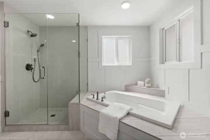 Ensuite goals. Every detail of this primary bathroom was designed to pamper, from the high-end plumbing fixtures to the flawless quartz counters and massive walk-in shower. Ensuite goals. Every detail of this primary bathroom was designed to pamper, from the high-end plumbing fixtures to the flawless quartz counters and massive walk-in shower.