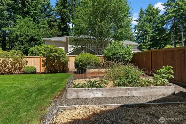 Green thumbs gather! For those who love to garden, enjoy this gorgeous area in your fully fenced backyard! Green thumbs gather! For those who love to garden, enjoy this gorgeous area in your fully fenced backyard!