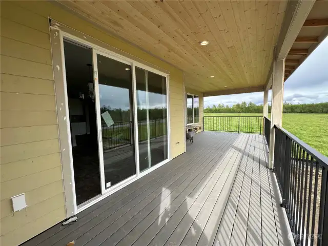 Expansive deck has views of nature, pond, and bay views