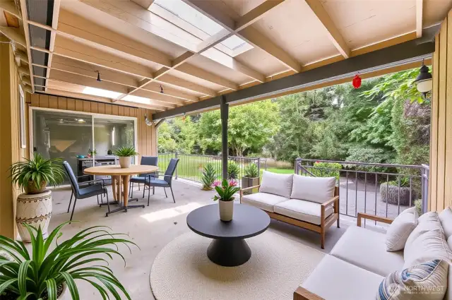 Virtually staged covered back deck.