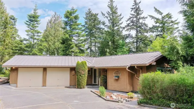 Great 2 car garage, circular drive and great additional parking.