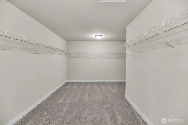 Primary walk-in closet, large enough to be a bedroom & ready for your custom storage system.