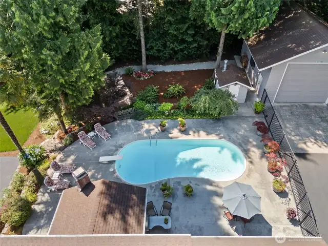 Safe & secure, the pool area is fully fenced from the driveway & shop over to include the entire side yard for play and storing recreation vehicles!