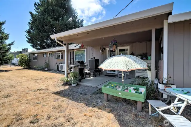 Back yard covered patio.  Big yard, fully fenced!
