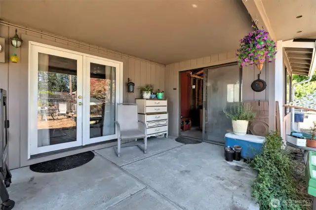 Back yard patio, with enclosed hot tub room.