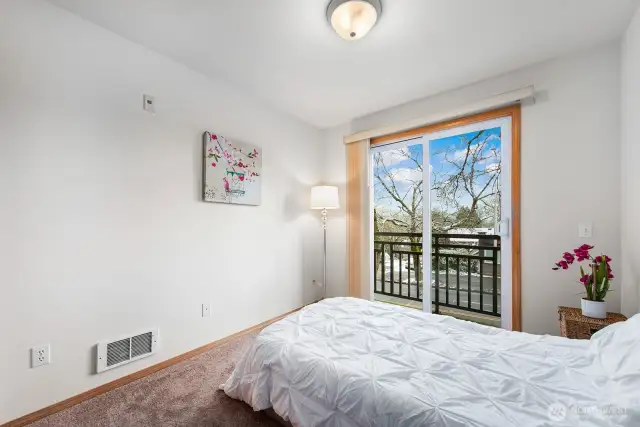 Bedroom #2 faces the building front and offers lots of natural light.