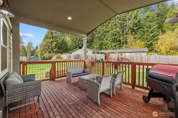 Covered entertaining space. Dual gates on deck.