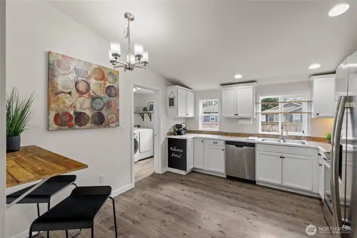 Kitchen with bar and table area.
