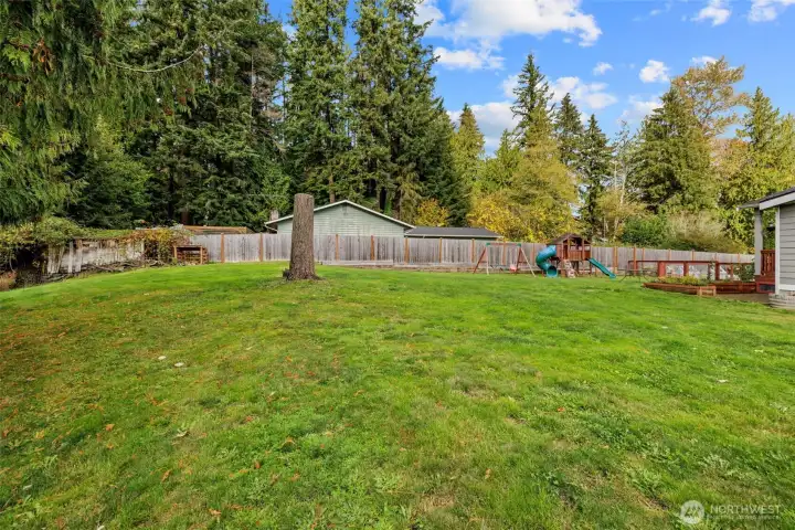 Approximate lot size 23,958 sq ft. Wood shelter stays with home.