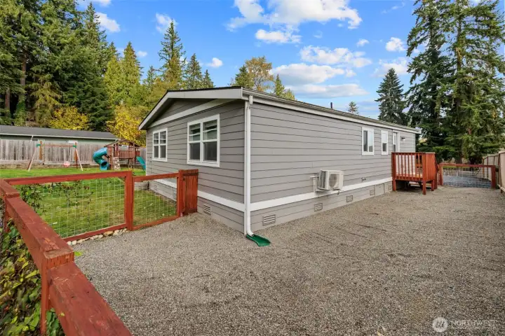 Dog run with gate to yard.