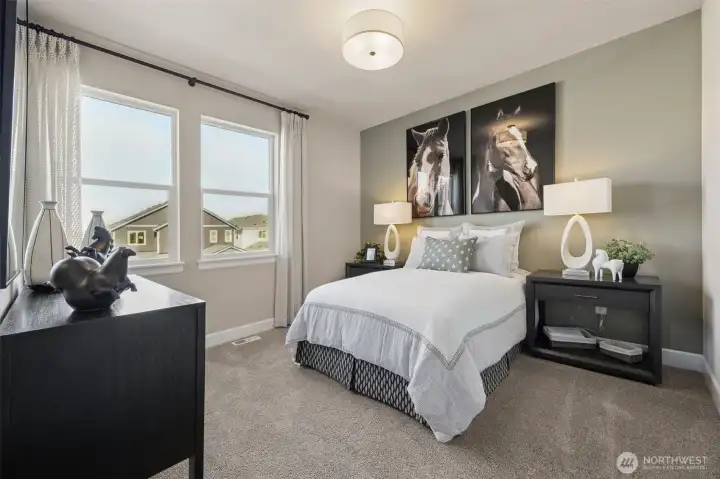 Guest bedroom. Photo is of the model, colors and finishes may vary.