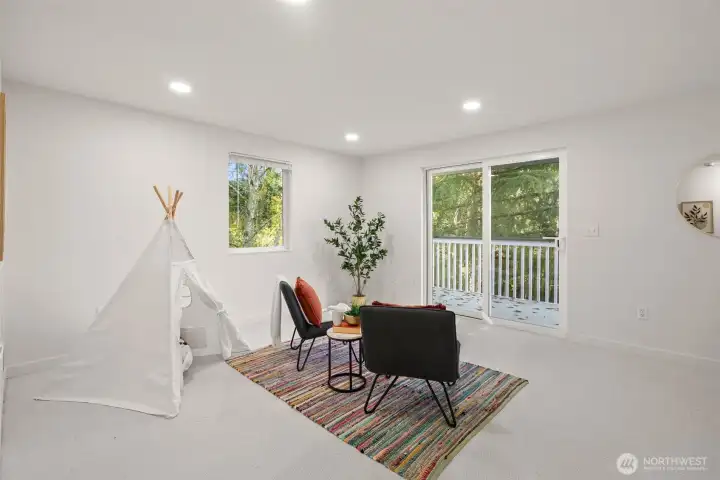 large loft/ flex room sliding doors which lead outside to upper deck large loft/ flex room sliding doors which lead outside to upper deck