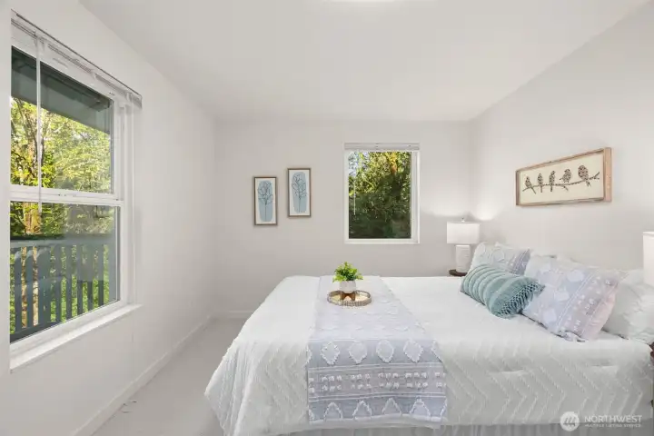 upper level - 2nd bedroom with water views upper level - 2nd bedroom with water views