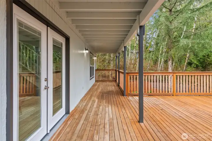 Double doors leading out onto your expansive deck. Double doors leading out onto your expansive deck.