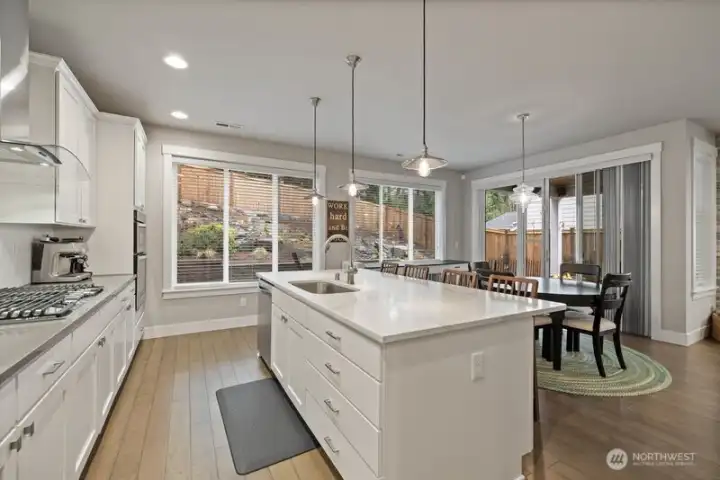 Kitchen and dining with view to the water feature in the backyard