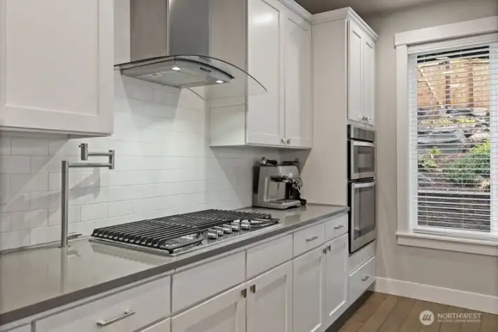 Kitchen and dining with view to the water feature in the backyard