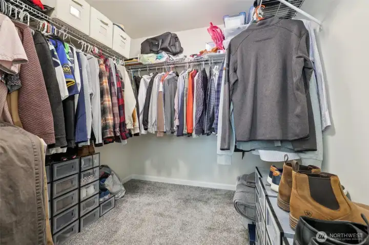 Walk-in closet just off the primary bathroom