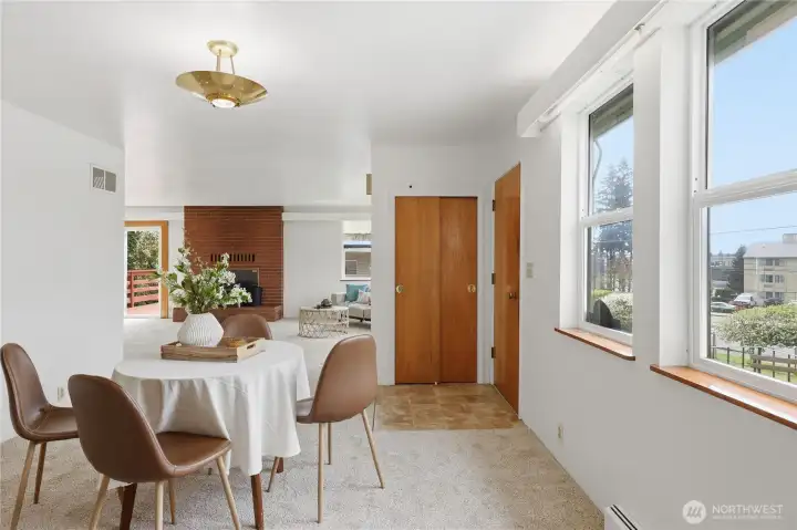 A view from the dining room leading into the living room.