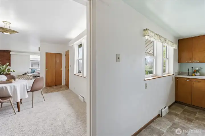 The dining room flows into the kitchen.