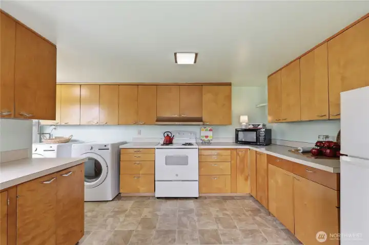 Lots of gorgeous cabinets for storage!