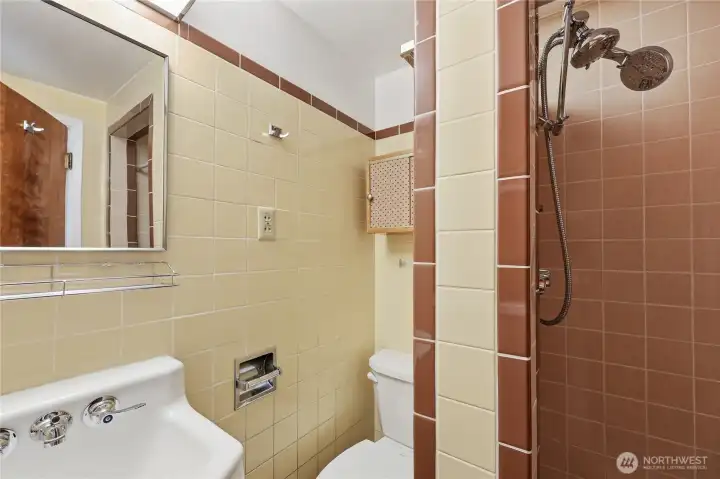 The pristine vintage tiled bathroom off from the primary bedroom!
