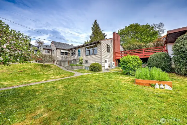 A fully fenced yard to cultivate, play and let the dogs run!