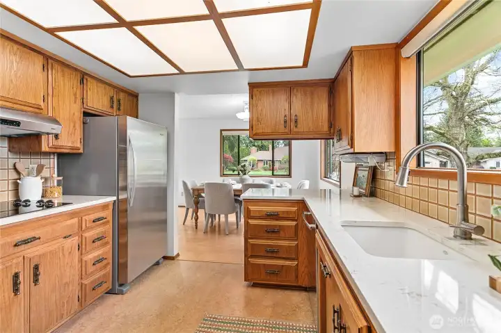 New quartz counters in kitchen and two bathrooms.