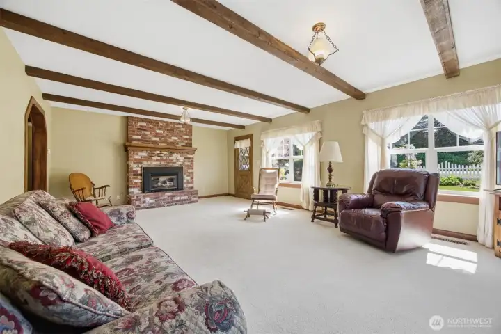 Large Living Room with Classic Beams & Propane Fireplace