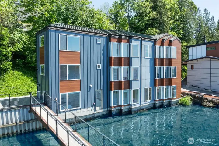 From the water, take in the impressive scale and design of this multi-level waterfront home featuring walls of windows positioned to capture the surrounding views. Direct waterfront access, expansive outdoor spaces, and a setting built for lakefront living create an unforgettable first impression.