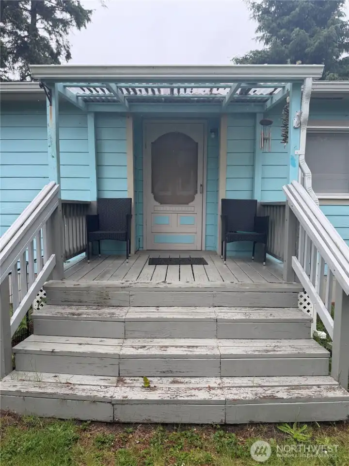 Darling covered porch as you enter home. Darling covered porch as you enter home.