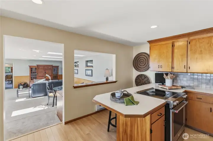 Centrally located, the kitchen connects the family room and guest suite to the east with the primary suite to the west, creating a thoughtful and functional layout. Centrally located, the kitchen connects the family room and guest suite to the east with the primary suite to the west, creating a thoughtful and functional layout.