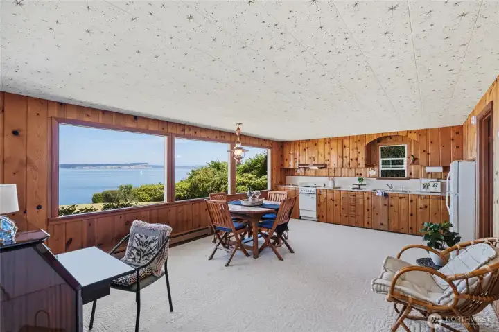 The guest wing features a comfortable living area, currently used as a home office, along with a full kitchen for added convenience. The guest wing features a comfortable living area, currently used as a home office, along with a full kitchen for added convenience.
