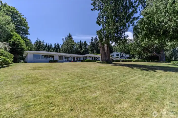 Looking back toward the home from the spacious backyard. Looking back toward the home from the spacious backyard.