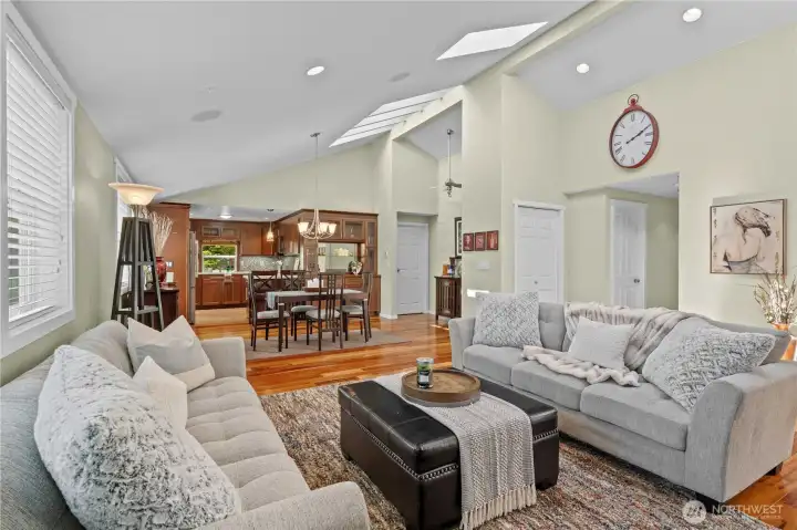 Living room open to dining and kitchen