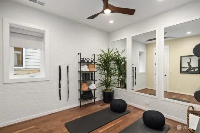 1st floor bedroom OR gym OR tucked away home office with walk-in closet. Photo of the Alabaster model home, includes upgrades & is not of actual home listed for sale.
