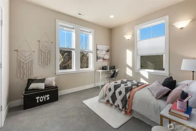 Light filled bedroom with oversized closet