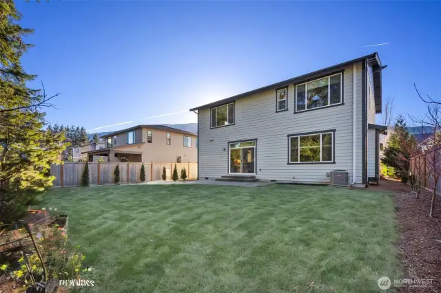 Large and private backyard just waiting for your personal design touches.