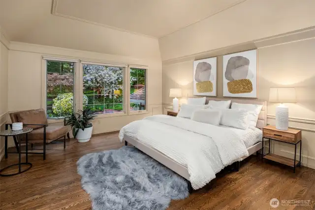 0versized Primary Suite with hardwood floors, coffered ceilings, walk-in closet