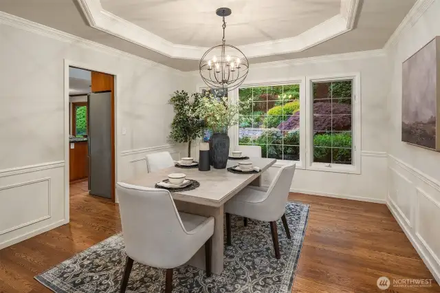 Dining room overlooks the amazing backyard