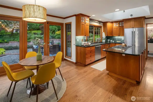 Open kitchen with french doors to one of two oversized patios