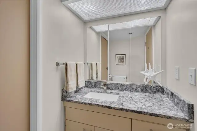 Guest half bath off entry hall