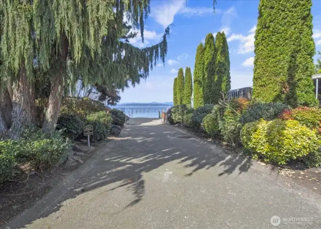 The walkway to Hidden Beach is to the right of the building entrance.