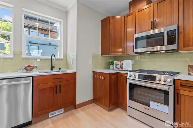 New Sink, base cabinet, Faucet & Garbage Disposal installed 2024