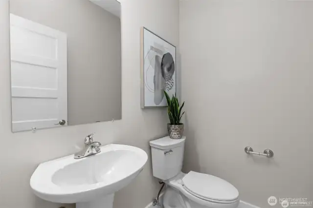 Main level Half Bathroom. New Toilet installed 2024