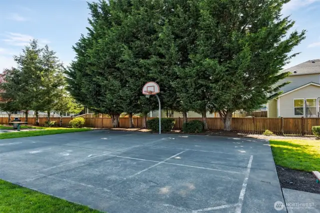 Basketball court & playground across the street