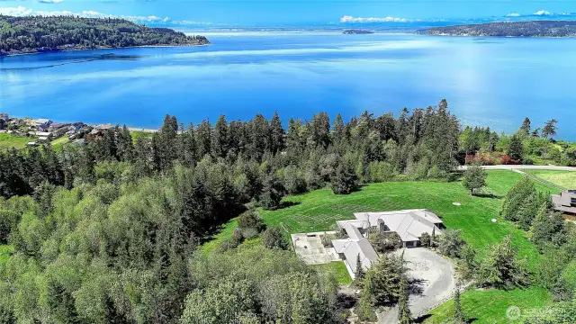 Take in All that Camano Has to offer, nestled in on over 5.75 acres with Natural Gas, on North End of Island