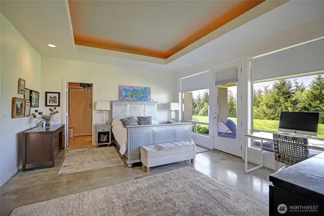 Master with stunning views of yard and bay