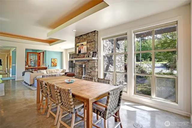 Stunning Rock Fireplace with Room for the large dinning table with built in cabinets for dinning