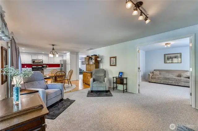 Great flow from the kitchen to the family room with a glimpse of dining room to the right of the kitchen.  Double door entry to the mainfloor office as well.