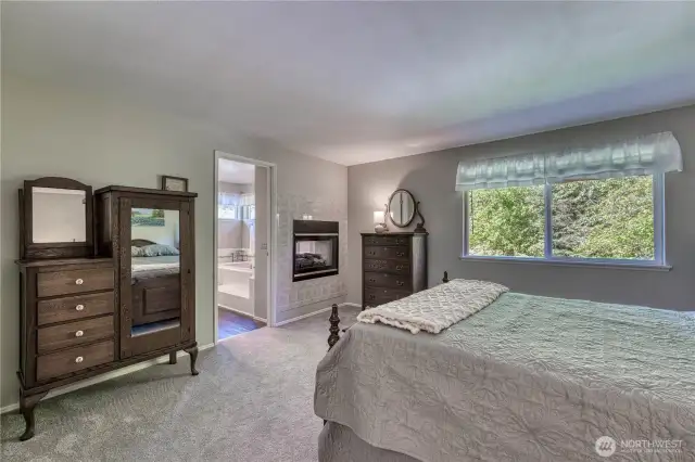 This room is very spacious with the added bonus of a gas fireplace.
